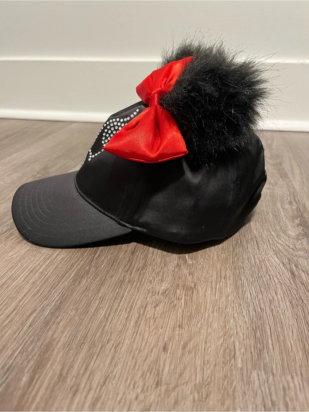 Disney Parks Black Faux Fur Ear Cap with Red Bow and Rhinestones NWOT